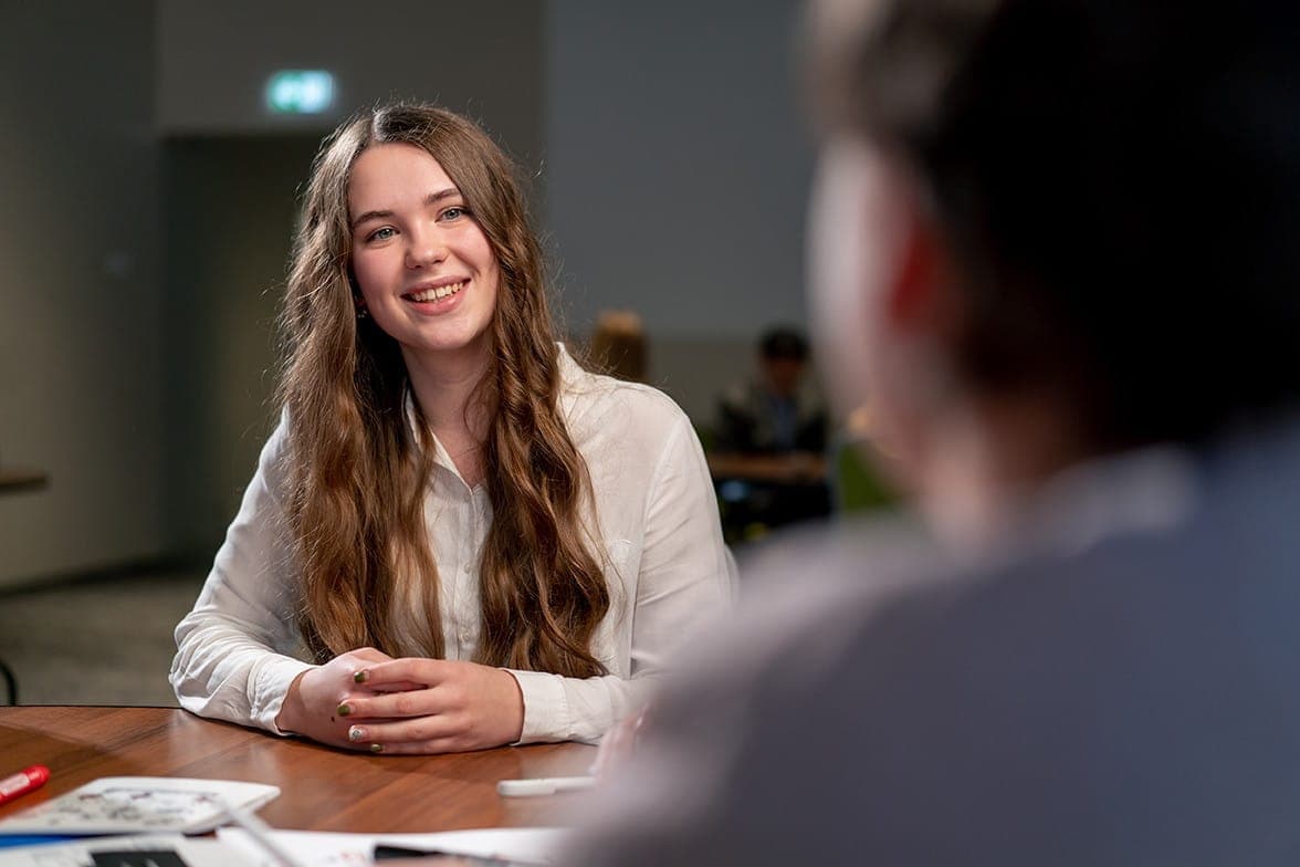 Student in college admissions consultation